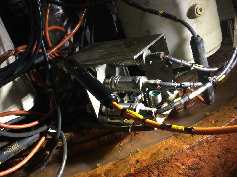 Subsea electrical connection and splice assembly supporting refurbishment and continued operation of offshore control systems.